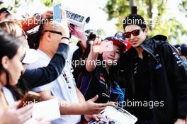 Esteban Ocon (FRA) Sahara Force India F1 Team with fans. 23.03.2017. Formula 1 World Championship, Rd 1, Australian Grand Prix, Albert Park, Melbourne, Australia, Preparation Day.