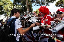 Lance Stroll (CDN) Williams signs autographs for the fans. 23.03.2017. Formula 1 World Championship, Rd 1, Australian Grand Prix, Albert Park, Melbourne, Australia, Preparation Day.