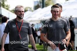 Stoffel Vandoorne (BEL) McLaren with Adam Cooper (GBR) McLaren Press Officer. 23.03.2017. Formula 1 World Championship, Rd 1, Australian Grand Prix, Albert Park, Melbourne, Australia, Preparation Day.