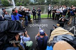 (L to R): Daniel Ricciardo (AUS) Red Bull Racing and team mate Max Verstappen (NLD) Red Bull Racing with the media after dinghy racing on the Yarra River. 22.03.2017. Formula 1 World Championship, Rd 1, Australian Grand Prix, Albert Park, Melbourne, Australia, Preparation Day.