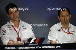 (L to R): Toto Wolff (GER) Mercedes AMG F1 Shareholder and Executive Director and Yusuke Hasegawa (JPN) Head of Honda F1 Programme in the FIA Press Conference. 07.07.2017. Formula 1 World Championship, Rd 9, Austrian Grand Prix, Spielberg, Austria, Practice Day.