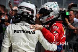 Race winner Valtteri Bottas (FIN) Mercedes AMG F1 celebrates in parc ferme with second placed Sebastian Vettel (GER) Ferrari. 09.07.2017. Formula 1 World Championship, Rd 9, Austrian Grand Prix, Spielberg, Austria, Race Day.