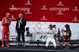 The podium (L to R): Sebastian Vettel (GER) Ferrari with Martin Brundle (GBR) Sky Sports Commentator; Valtteri Bottas (FIN) Mercedes AMG F1; and Daniel Ricciardo (AUS) Red Bull Racing. 09.07.2017. Formula 1 World Championship, Rd 9, Austrian Grand Prix, Spielberg, Austria, Race Day.