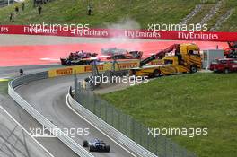 Daniil Kvyat (RUS) Scuderia Toro Rosso STR12 locks up under braking at the start of the race, hitting Fernando Alonso (ESP) McLaren MCL32 and Max Verstappen (NLD) Red Bull Racing RB13. 09.07.2017. Formula 1 World Championship, Rd 9, Austrian Grand Prix, Spielberg, Austria, Race Day.