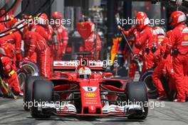 Sebastian Vettel (GER) Scuderia Ferrari during pitstop 09.07.2017. Formula 1 World Championship, Rd 9, Austrian Grand Prix, Spielberg, Austria, Race Day.