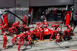 Sebastian Vettel (GER) Ferrari SF70H makes a pit stop. 09.07.2017. Formula 1 World Championship, Rd 9, Austrian Grand Prix, Spielberg, Austria, Race Day.