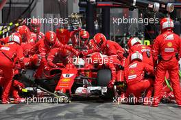 Sebastian Vettel (GER) Scuderia Ferrari during pitstop 09.07.2017. Formula 1 World Championship, Rd 9, Austrian Grand Prix, Spielberg, Austria, Race Day.