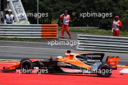 Fernando Alonso (ESP) McLaren MCL32 crashes at the start of the race. 09.07.2017. Formula 1 World Championship, Rd 9, Austrian Grand Prix, Spielberg, Austria, Race Day.
