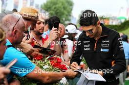 Esteban Ocon (FRA) Sahara Force India F1 Team signs autographs for the fans. 08.07.2017. Formula 1 World Championship, Rd 9, Austrian Grand Prix, Spielberg, Austria, Qualifying Day.