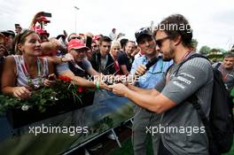 Fernando Alonso (ESP) McLaren signs autographs for the fans. 08.07.2017. Formula 1 World Championship, Rd 9, Austrian Grand Prix, Spielberg, Austria, Qualifying Day.