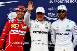 Qualifying top three in parc ferme (L to R): Sebastian Vettel (GER) Ferrari, second; Valtteri Bottas (FIN) Mercedes AMG F1, pole position; Lewis Hamilton (GBR) Mercedes AMG F1, third. 08.07.2017. Formula 1 World Championship, Rd 9, Austrian Grand Prix, Spielberg, Austria, Qualifying Day.