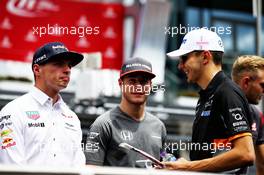 (L to R): Max Verstappen (NLD) Red Bull Racing with Stoffel Vandoorne (BEL) McLaren and Esteban Ocon (FRA) Sahara Force India F1 Team on the drivers parade. 09.07.2017. Formula 1 World Championship, Rd 9, Austrian Grand Prix, Spielberg, Austria, Race Day.