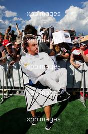 Fernando Alonso (ESP) McLaren signs autographs for the fans with a cardboard cutout of himself. 06.07.2017. Formula 1 World Championship, Rd 9, Austrian Grand Prix, Spielberg, Austria, Preparation Day.