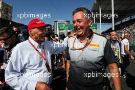 (L to R): Niki Lauda (AUT) Mercedes Non-Executive Chairman with Mario Isola (ITA) Pirelli Racing Manager on the grid. 25.06.2017. Formula 1 World Championship, Rd 8, Azerbaijan Grand Prix, Baku Street Circuit, Azerbaijan, Race Day.
