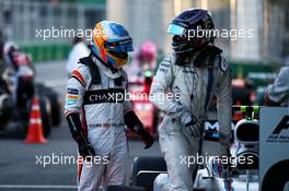 (L to R): Fernando Alonso (ESP) McLaren with third placed Lance Stroll (CDN) Williams in parc ferme. 25.06.2017. Formula 1 World Championship, Rd 8, Azerbaijan Grand Prix, Baku Street Circuit, Azerbaijan, Race Day.