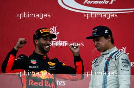 The podium (L to R): Race winner Daniel Ricciardo (AUS) Red Bull Racing celebrates with third placed Lance Stroll (CDN) Williams. 25.06.2017. Formula 1 World Championship, Rd 8, Azerbaijan Grand Prix, Baku Street Circuit, Azerbaijan, Race Day.