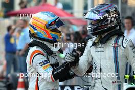 Fernando Alonso (ESP) McLaren F1 and Lance Stroll (CDN) Williams F1 Team  25.06.2017. Formula 1 World Championship, Rd 8, Azerbaijan Grand Prix, Baku Street Circuit, Azerbaijan, Race Day.