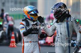 Fernando Alonso (ESP) McLaren MCL32 and Lance Stroll (CDN) Williams FW40. 25.06.2017. Formula 1 World Championship, Rd 8, Azerbaijan Grand Prix, Baku Street Circuit, Azerbaijan, Race Day.