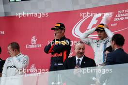 The podium (L to R): Valtteri Bottas (FIN) Mercedes AMG F1, second; Daniel Ricciardo (AUS) Red Bull Racing, race winner; Lance Stroll (CDN) Williams, third. 25.06.2017. Formula 1 World Championship, Rd 8, Azerbaijan Grand Prix, Baku Street Circuit, Azerbaijan, Race Day.