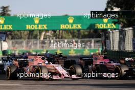 Sergio Perez (MEX) Sahara Force India F1 VJM10 and Esteban Ocon (FRA) Sahara Force India F1 VJM10 battle for position. 25.06.2017. Formula 1 World Championship, Rd 8, Azerbaijan Grand Prix, Baku Street Circuit, Azerbaijan, Race Day.
