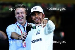 Pole sitter Lewis Hamilton (GBR) Mercedes AMG F1 in qualifying parc ferme with Davide Valsecchi (ITA) Sky F1 Italia Presenter. 24.06.2017. Formula 1 World Championship, Rd 8, Azerbaijan Grand Prix, Baku Street Circuit, Azerbaijan, Qualifying Day.