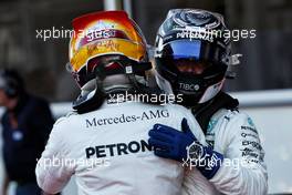 (L to R): Lewis Hamilton (GBR) Mercedes AMG F1 celebrates his pole position in parc ferme with second placed team mate Valtteri Bottas (FIN) Mercedes AMG F1. 24.06.2017. Formula 1 World Championship, Rd 8, Azerbaijan Grand Prix, Baku Street Circuit, Azerbaijan, Qualifying Day.