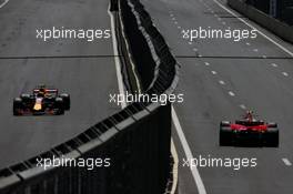 Max Verstappen (NLD) Red Bull Racing RB13 and Kimi Raikkonen (FIN) Ferrari SF70H. 24.06.2017. Formula 1 World Championship, Rd 8, Azerbaijan Grand Prix, Baku Street Circuit, Azerbaijan, Qualifying Day.