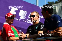 (L to R): Sebastian Vettel (GER) Ferrari with Valtteri Bottas (FIN) Mercedes AMG F1 and Pascal Wehrlein (GER) Sauber F1 Team on the drivers parade. 25.06.2017. Formula 1 World Championship, Rd 8, Azerbaijan Grand Prix, Baku Street Circuit, Azerbaijan, Race Day.
