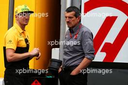 (L to R): Nico Hulkenberg (GER) Renault Sport F1 Team with Guenther Steiner (ITA) Haas F1 Team Prinicipal. 22.06.2017. Formula 1 World Championship, Rd 8, Azerbaijan Grand Prix, Baku Street Circuit, Azerbaijan, Preparation Day.