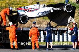 The Williams FW40 of Lance Stroll (CDN) Williams is recovered back to the pits on the back of a truck. 01.03.2017. Formula One Testing, Day Three, Barcelona, Spain. Wednesday.
