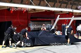 Mercedes AMG F1 W08 under wraps as it is pushed by mechanics in the pits. 07.03.2017. Formula One Testing, Day One, Barcelona, Spain. Tuesday.