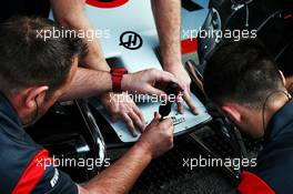 Haas F1 Team mechanics work on the Haas VF-17. 25.08.2017. Formula 1 World Championship, Rd 12, Belgian Grand Prix, Spa Francorchamps, Belgium, Practice Day.