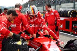Sebastian Vettel (GER) Ferrari SF70H on the grid. 27.08.2017. Formula 1 World Championship, Rd 12, Belgian Grand Prix, Spa Francorchamps, Belgium, Race Day.
