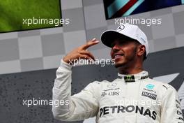 Race winner Lewis Hamilton (GBR) Mercedes AMG F1 celebrates on the podium. 27.08.2017. Formula 1 World Championship, Rd 12, Belgian Grand Prix, Spa Francorchamps, Belgium, Race Day.