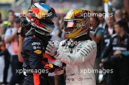 Daniel Ricciardo (AUS) Red Bull Racing RB13 and Lewis Hamilton (GBR) Mercedes AMG F1 W08. 27.08.2017. Formula 1 World Championship, Rd 12, Belgian Grand Prix, Spa Francorchamps, Belgium, Race Day.