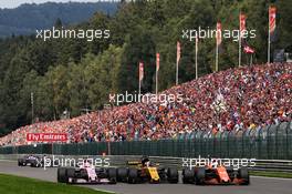(L to R): Esteban Ocon (FRA) Sahara Force India F1 VJM10; Nico Hulkenberg (GER) Renault Sport F1 Team RS17; and Fernando Alonso (ESP) McLaren MCL32; battle for position. 27.08.2017. Formula 1 World Championship, Rd 12, Belgian Grand Prix, Spa Francorchamps, Belgium, Race Day.