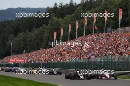 (L to R): Kevin Magnussen (DEN) Haas VF-17 and Sergio Perez (MEX) Sahara Force India F1 VJM10 at the start of the race. 27.08.2017. Formula 1 World Championship, Rd 12, Belgian Grand Prix, Spa Francorchamps, Belgium, Race Day.