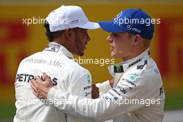 Lewis Hamilton (GBR) Mercedes AMG F1  and Valtteri Bottas (FIN) Mercedes AMG F1  26.08.2017. Formula 1 World Championship, Rd 12, Belgian Grand Prix, Spa Francorchamps, Belgium, Qualifying Day.