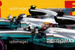 Pole sitter Lewis Hamilton (GBR) Mercedes AMG F1 W08 with third placed team mate Valtteri Bottas (FIN) Mercedes AMG F1 W08 in qualifying parc ferme. 26.08.2017. Formula 1 World Championship, Rd 12, Belgian Grand Prix, Spa Francorchamps, Belgium, Qualifying Day.
