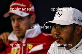 Lewis Hamilton (GBR) Mercedes AMG F1 and Sebastian Vettel (GER) Ferrari in the post qualifying FIA Press Conference. 26.08.2017. Formula 1 World Championship, Rd 12, Belgian Grand Prix, Spa Francorchamps, Belgium, Qualifying Day.
