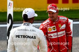 (L to R): Lewis Hamilton (GBR) Mercedes AMG F1 celebrates his pole position in qualifying parc ferme with second placed Sebastian Vettel (GER) Ferrari. 26.08.2017. Formula 1 World Championship, Rd 12, Belgian Grand Prix, Spa Francorchamps, Belgium, Qualifying Day.