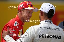 Sebastian Vettel (GER) Scuderia Ferrari and Lewis Hamilton (GBR) Mercedes AMG F1   26.08.2017. Formula 1 World Championship, Rd 12, Belgian Grand Prix, Spa Francorchamps, Belgium, Qualifying Day.