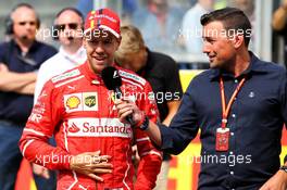 (L to R): Second placed Sebastian Vettel (GER) Ferrari in qualifying parc ferme with Will Buxton (GBR) NBC Sports Network TV Presenter. 26.08.2017. Formula 1 World Championship, Rd 12, Belgian Grand Prix, Spa Francorchamps, Belgium, Qualifying Day.