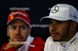 Lewis Hamilton (GBR) Mercedes AMG F1 and Sebastian Vettel (GER) Ferrari in the post qualifying FIA Press Conference. 26.08.2017. Formula 1 World Championship, Rd 12, Belgian Grand Prix, Spa Francorchamps, Belgium, Qualifying Day.