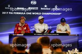 (L to R): Sebastian Vettel (GER) Ferrari; Lewis Hamilton (GBR) Mercedes AMG F1; and Valtteri Bottas (FIN) Mercedes AMG F1, in the post qualifying FIA Press Conference. 26.08.2017. Formula 1 World Championship, Rd 12, Belgian Grand Prix, Spa Francorchamps, Belgium, Qualifying Day.