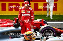 Sebastian Vettel (GER) Ferrari looks at the Mercedes AMG F1 W08 of pole sitter Lewis Hamilton (GBR) Mercedes AMG F1 in qualifying parc ferme. 26.08.2017. Formula 1 World Championship, Rd 12, Belgian Grand Prix, Spa Francorchamps, Belgium, Qualifying Day.