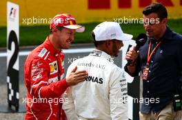 Lewis Hamilton (GBR) Mercedes AMG F1 (Right) celebrates his pole position in qualifying parc ferme with second placed Sebastian Vettel (GER) Ferrari. 26.08.2017. Formula 1 World Championship, Rd 12, Belgian Grand Prix, Spa Francorchamps, Belgium, Qualifying Day.
