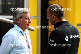 (L to R): Carlos Sainz (ESP) with Cyril Abiteboul (FRA) Renault Sport F1 Managing Director. 27.08.2017. Formula 1 World Championship, Rd 12, Belgian Grand Prix, Spa Francorchamps, Belgium, Race Day.