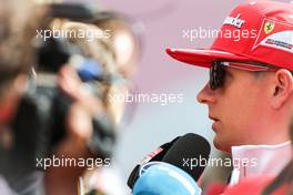 Kimi Raikkonen (FIN) Ferrari with the media. 24.08.2017. Formula 1 World Championship, Rd 12, Belgian Grand Prix, Spa Francorchamps, Belgium, Preparation Day.
