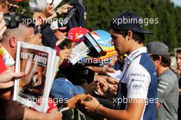 Lance Stroll (CDN) Williams signs autographs for the fans. 24.08.2017. Formula 1 World Championship, Rd 12, Belgian Grand Prix, Spa Francorchamps, Belgium, Preparation Day.